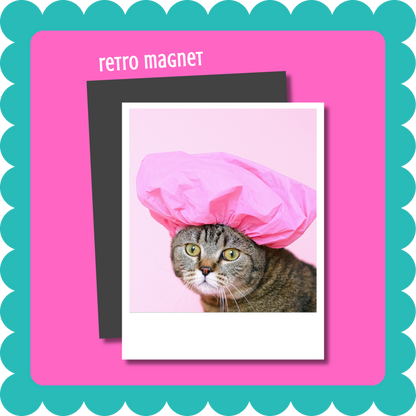 Vintage Retro Polaroid-style custom photo magnet, flexible 2mm thick personalized fridge magnet with uploaded photo. Cat wearing a pink shower cap on a retro magnet with a pink border. Cat Magnet